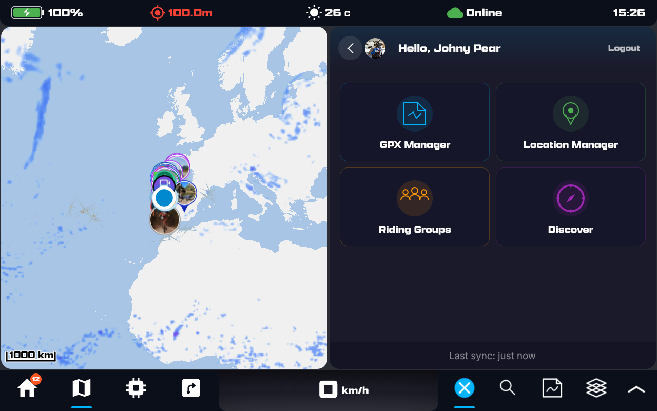 The HUB open on the right of the map: a 'Hello' greeting, the four areas GPX Manager, Location Manager, Riding Groups and Discover, and 'Last sync: just now'