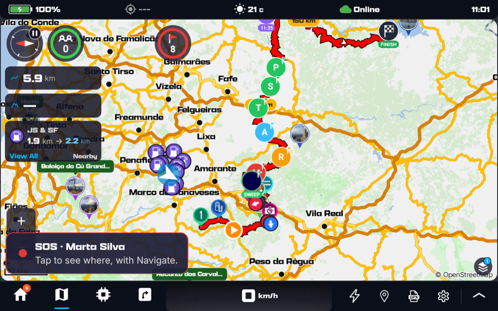 The map with event riders along the route, the finish flag at the end of the route, the red event button with 8 riders, and the red SOS notice in the corner