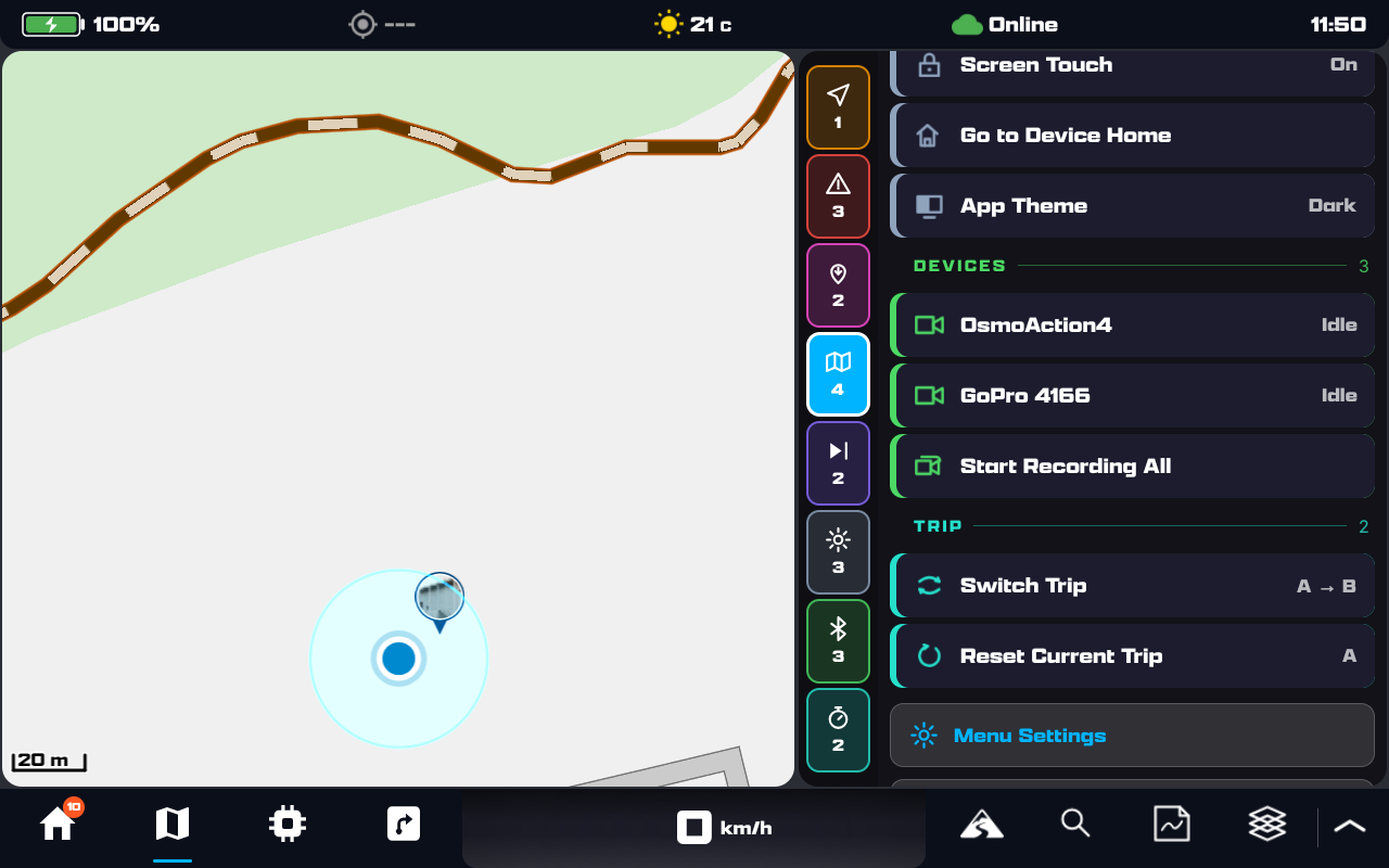 The menu scrolled to the teal Trip family: a Switch Trip row showing A arrow B, and a Reset Current Trip row showing A, above the Devices family's paired cameras and the pinned Menu Settings row