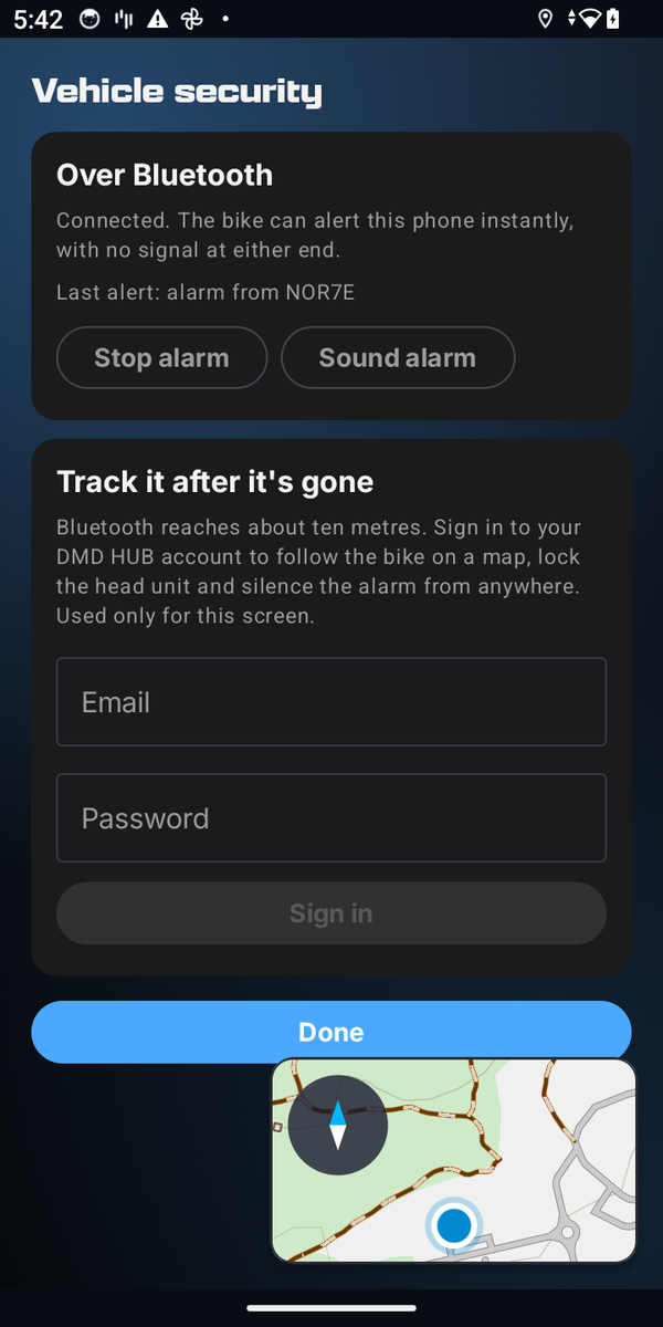 Phone Link Vehicle security screen: Over Bluetooth with Stop alarm and Sound alarm buttons, and a DMD HUB sign-in below